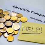 Why Is My NEPA Bill So High? A Breakdown of DisCo Tariffs (R1–R4) and How to Estimate Yours electricity-bill-coins-jar-savings-text-yellow-note-help-increase-prices-tariffs-piggy-bank-ticket-energy-241553970